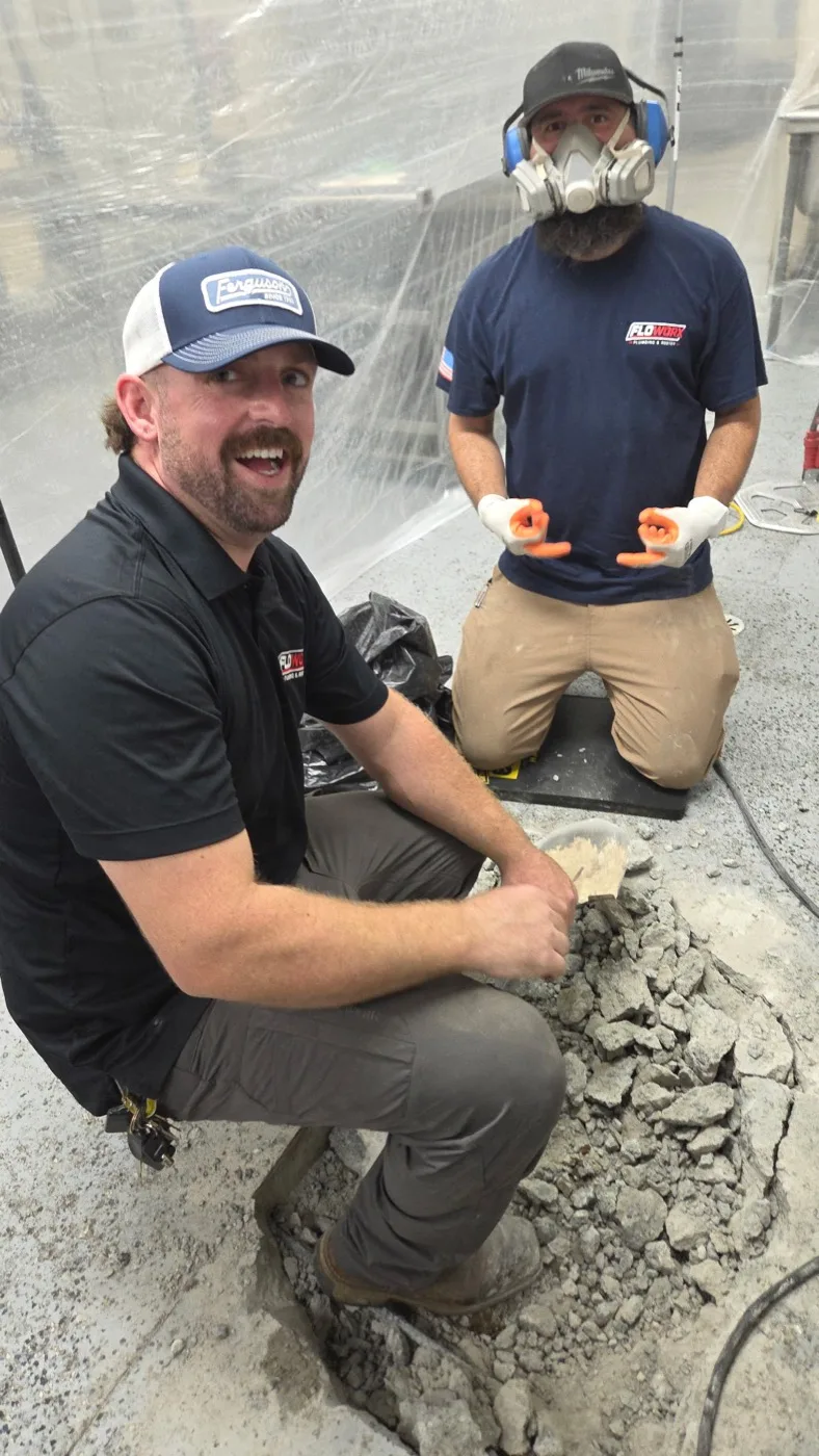 Floworx crew working on a plumbing repair